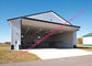 Sert Metal Sandviç Panel ile Çift Panel Hidrolik Hangar Kapı Üst Katlanır Endüstriyel Garaj Kapıları Tedarikçi
